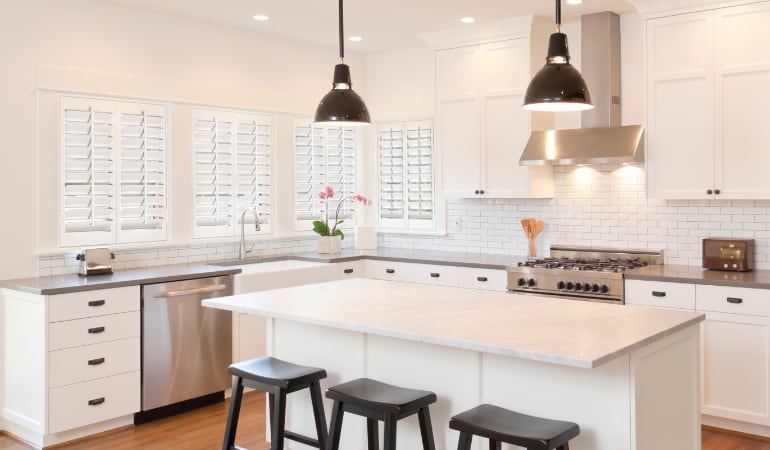 Plantation shutters in a bright Fort Lauderdale kitchen.